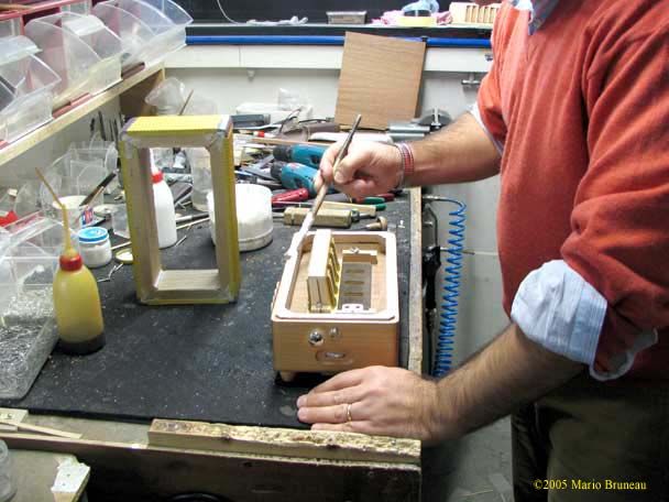 Bompezzoglue Gluing bellows at Bompezzo accordion maker